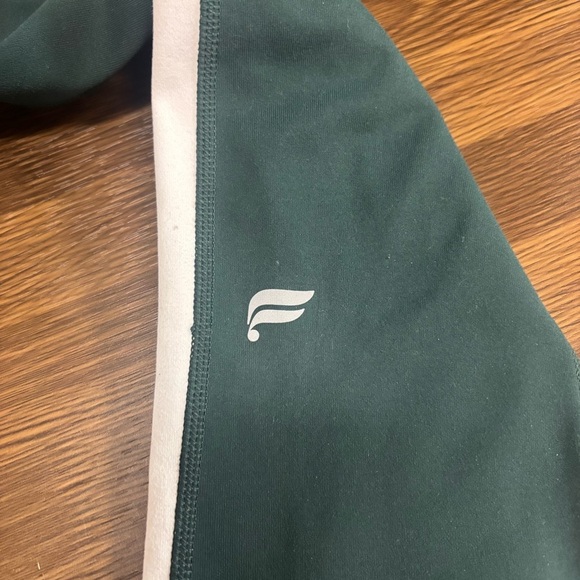 Fabletics On-The-Go PowerHold® High-Waisted Capri Leggings Deep Sea Green - Picture 6 of 8